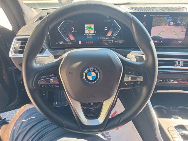used 2024 BMW 330e car, priced at $29,399