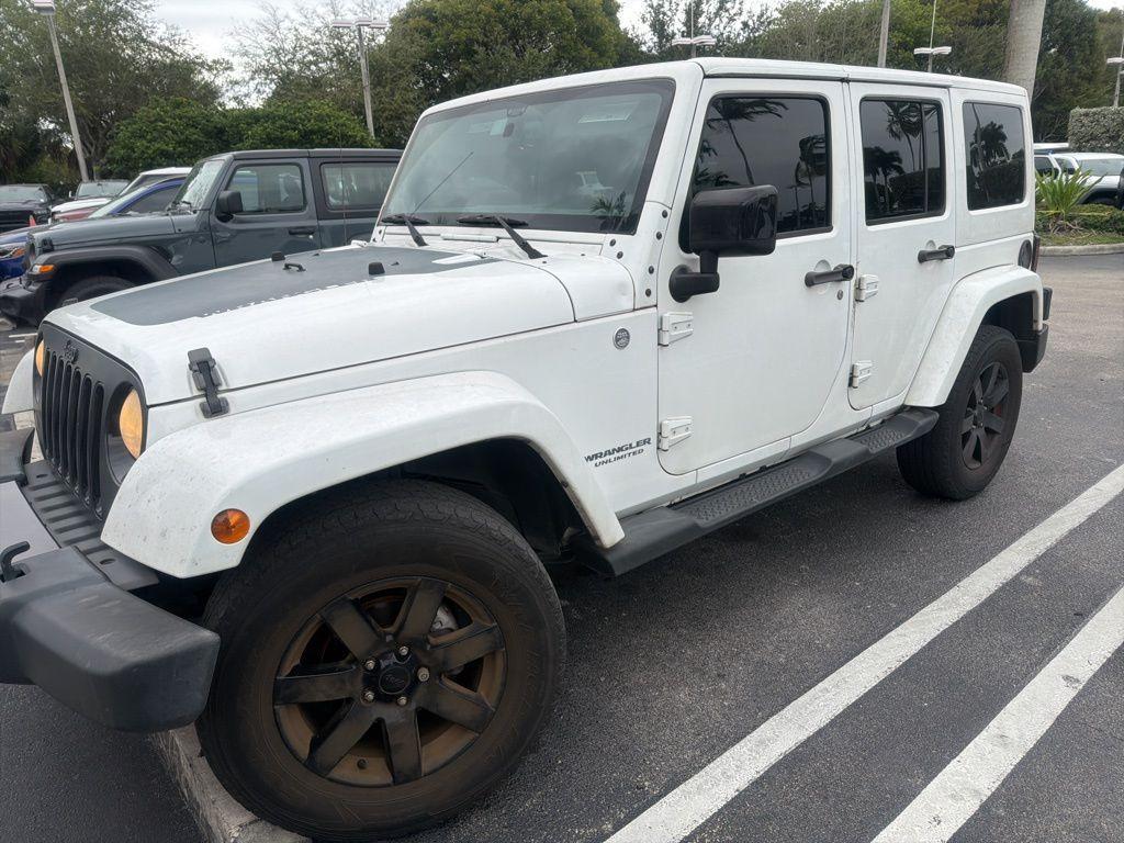 used 2014 Jeep Wrangler Unlimited car, priced at $13,990
