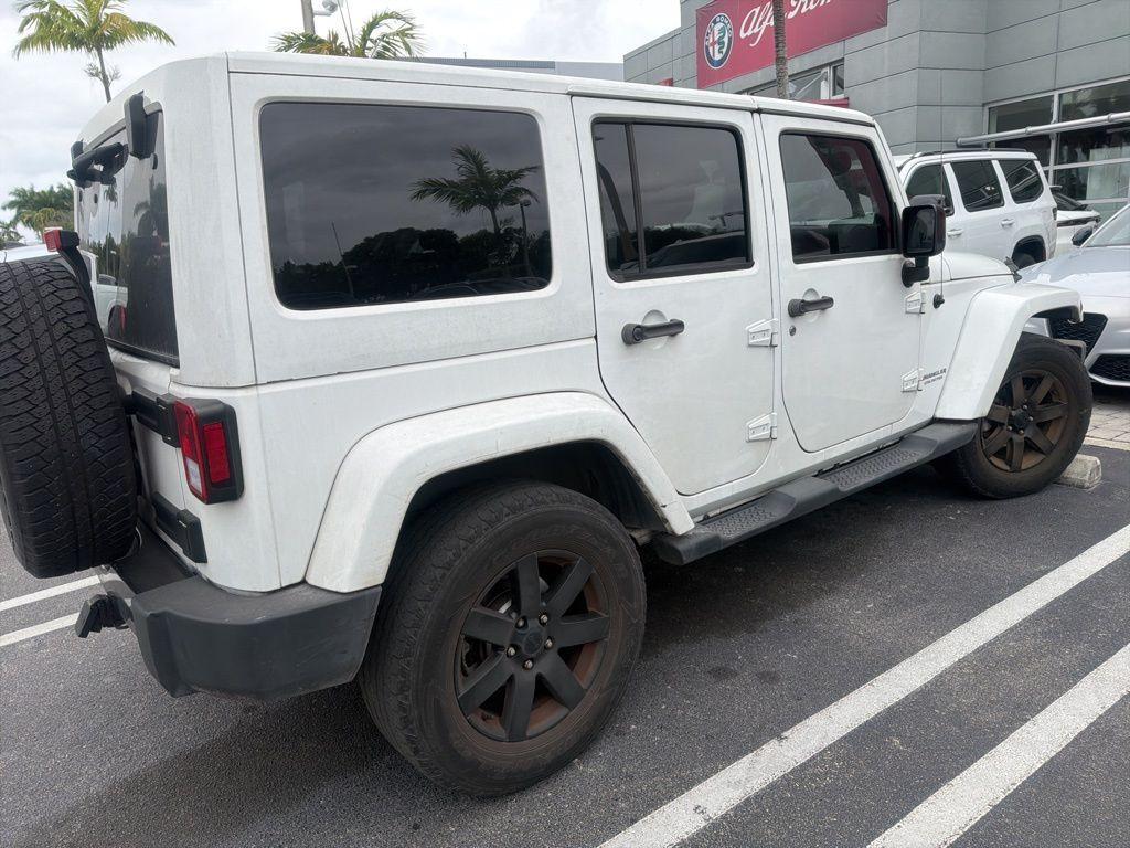 used 2014 Jeep Wrangler Unlimited car, priced at $13,990