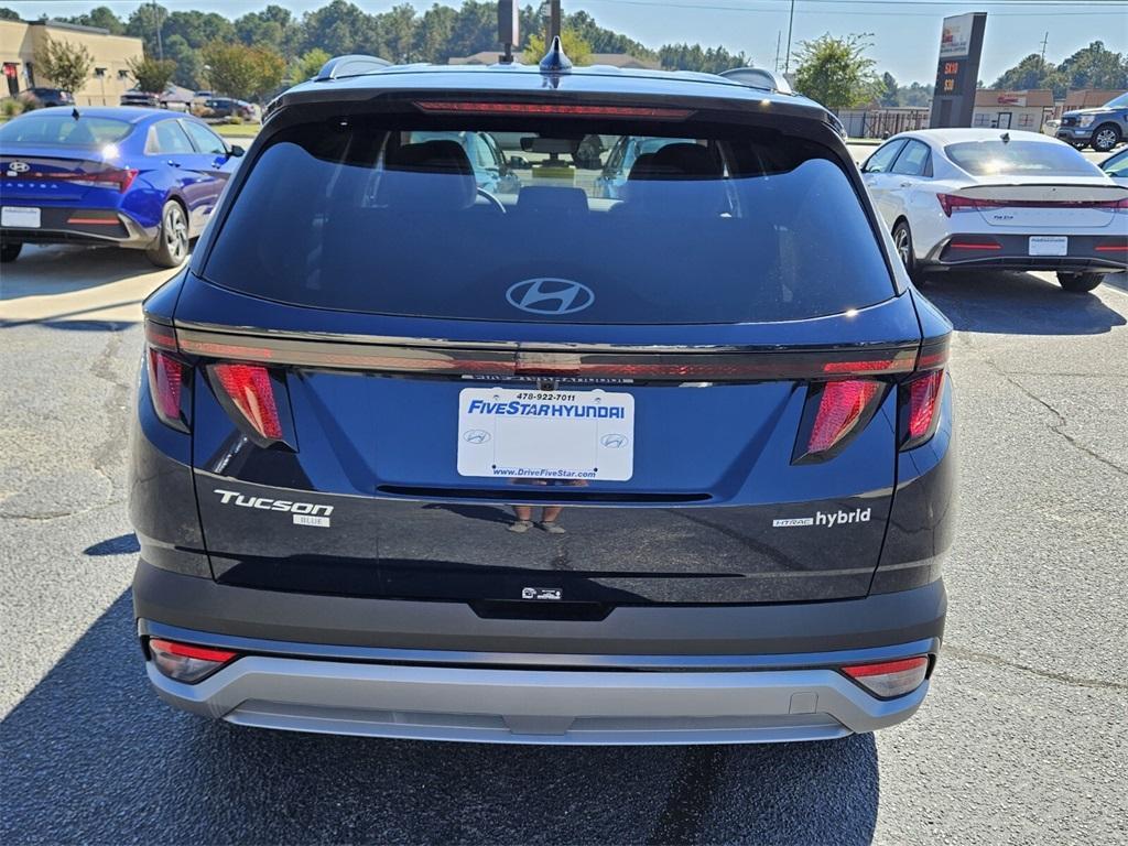 new 2025 Hyundai TUCSON Hybrid car, priced at $31,061