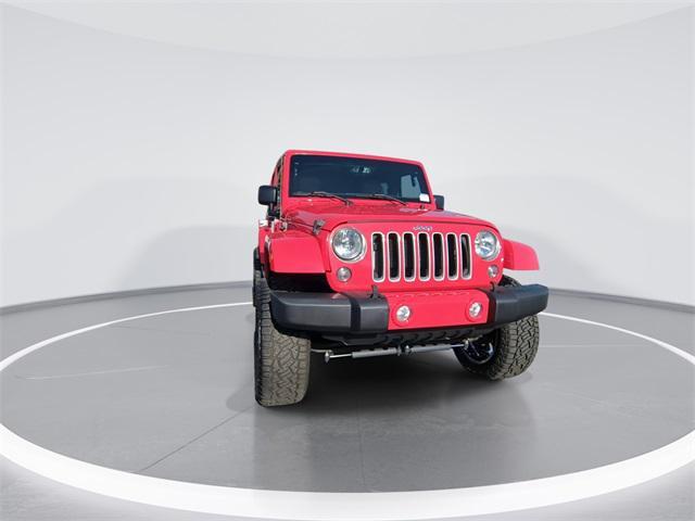 used 2016 Jeep Wrangler Unlimited car, priced at $16,385