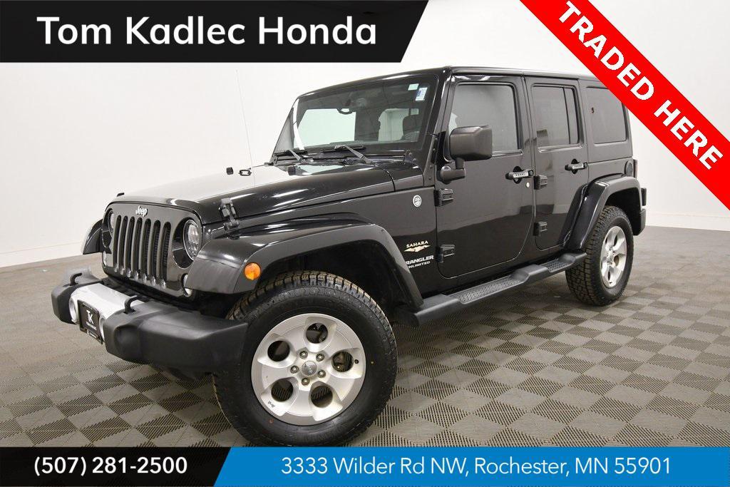 used 2014 Jeep Wrangler Unlimited car, priced at $15,249