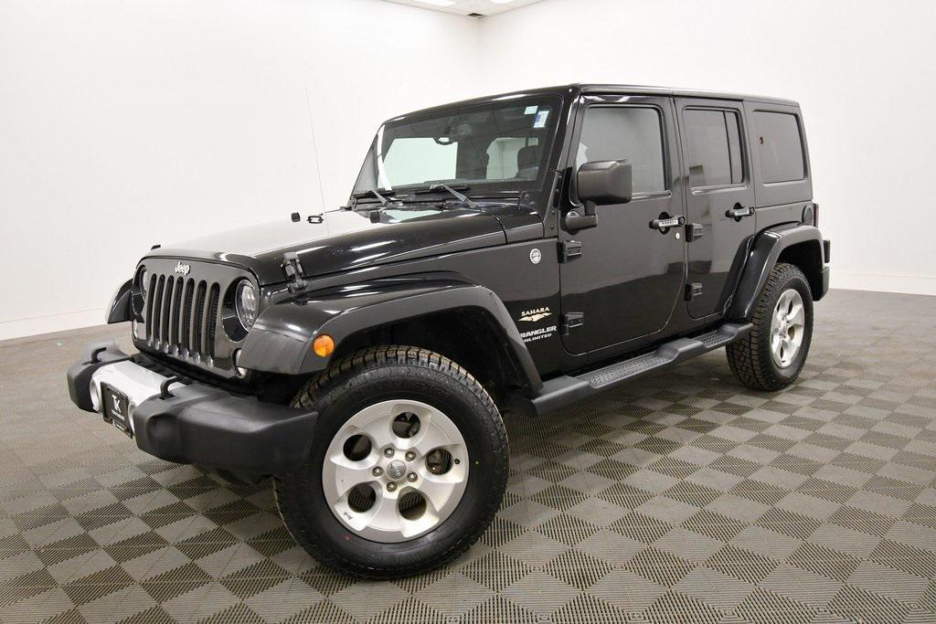 used 2014 Jeep Wrangler Unlimited car, priced at $15,249