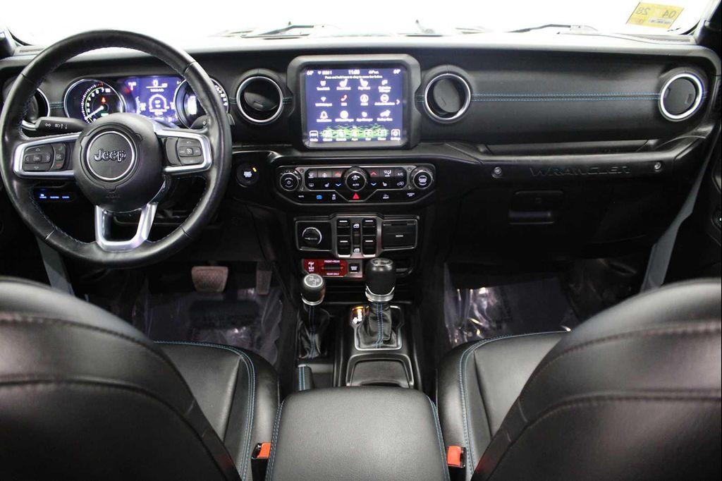 used 2023 Jeep Wrangler 4xe car, priced at $29,658