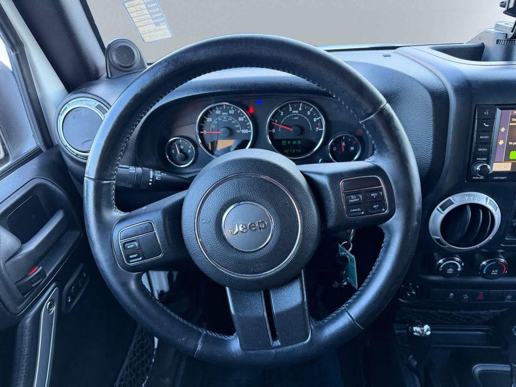 used 2013 Jeep Wrangler Unlimited car, priced at $10,968