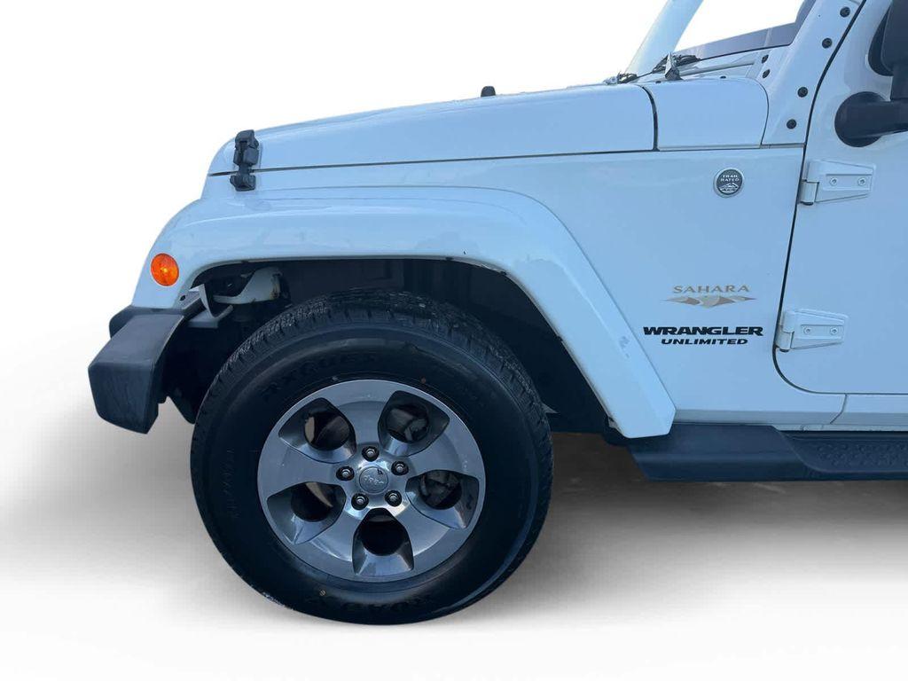 used 2013 Jeep Wrangler Unlimited car, priced at $10,968
