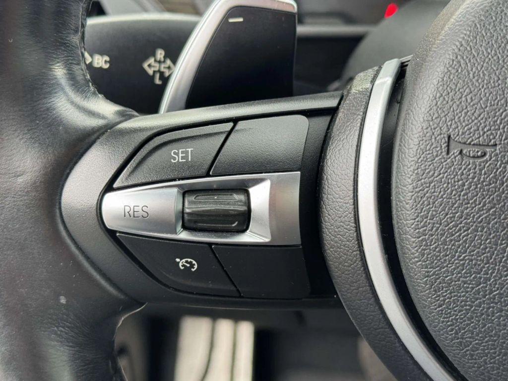 used 2015 BMW 228 car, priced at $11,990