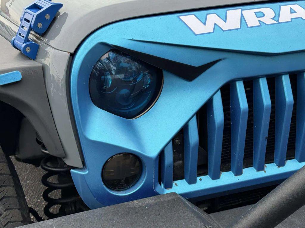 used 2015 Jeep Wrangler Unlimited car, priced at $13,990