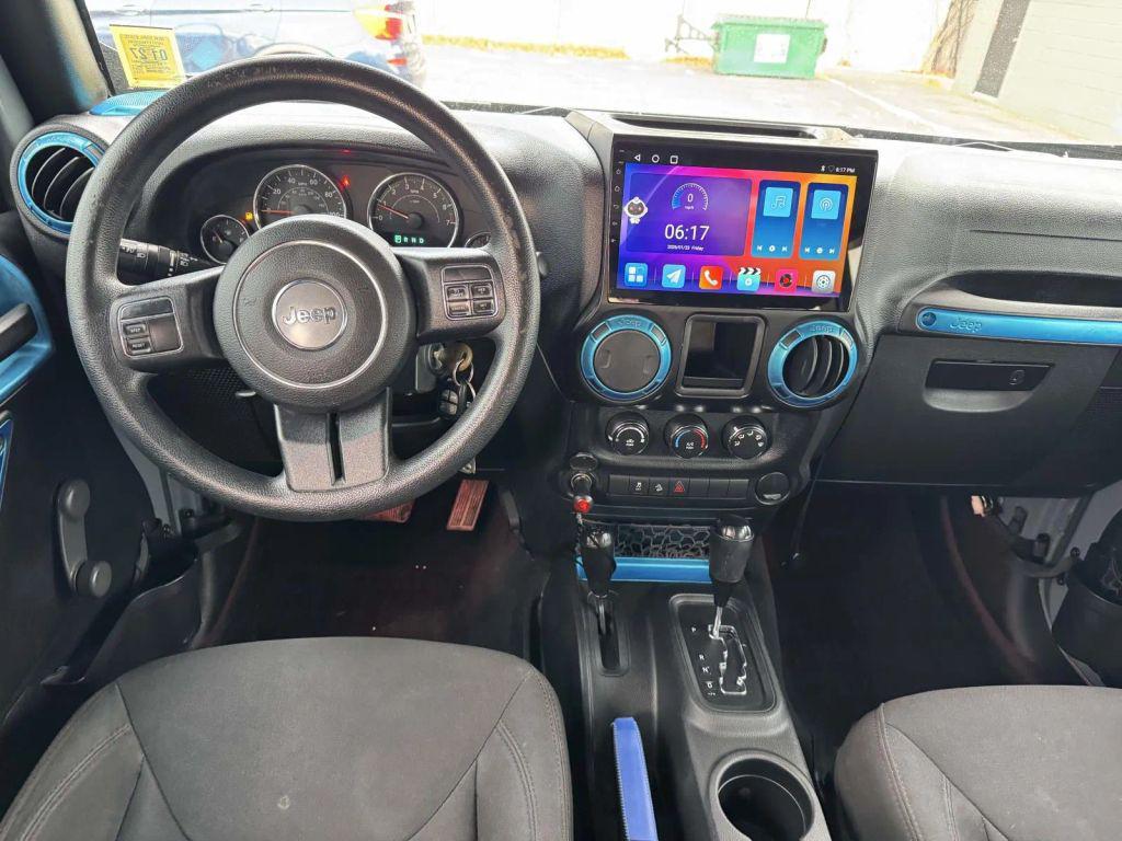 used 2015 Jeep Wrangler Unlimited car, priced at $13,990