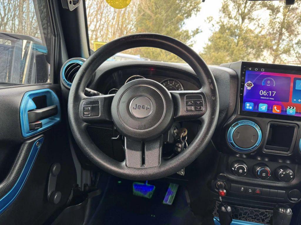 used 2015 Jeep Wrangler Unlimited car, priced at $13,990