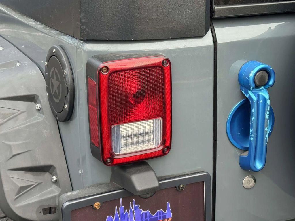 used 2015 Jeep Wrangler Unlimited car, priced at $13,990