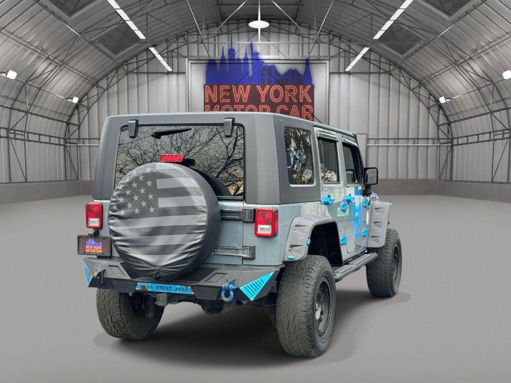 used 2015 Jeep Wrangler Unlimited car, priced at $13,990