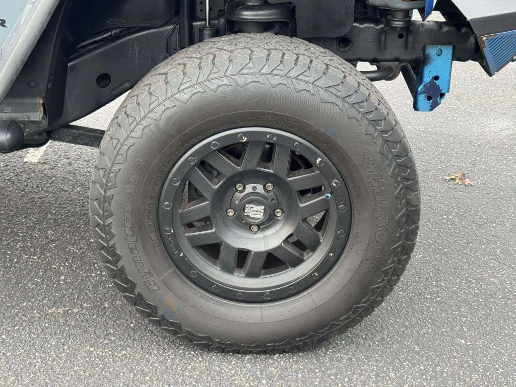 used 2015 Jeep Wrangler Unlimited car, priced at $13,990