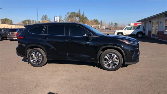 used 2021 Toyota Highlander Hybrid car, priced at $27,337
