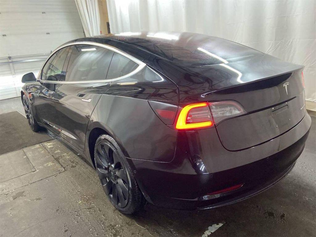 used 2018 Tesla Model 3 car, priced at $18,500