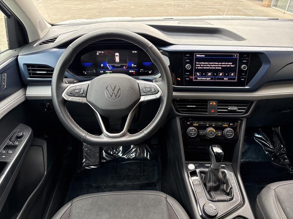 used 2024 Volkswagen Taos car, priced at $19,995