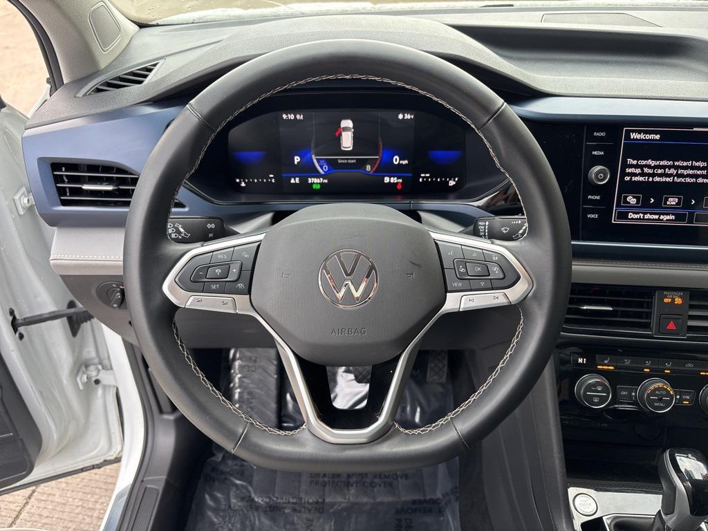 used 2024 Volkswagen Taos car, priced at $19,995