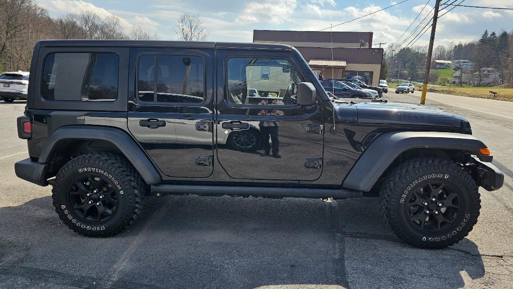 used 2021 Jeep Wrangler Unlimited car, priced at $26,250