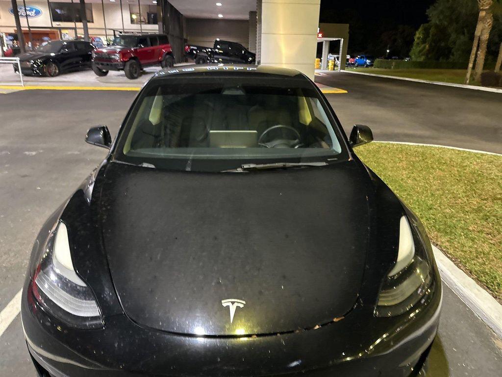 used 2023 Tesla Model 3 car, priced at $21,491