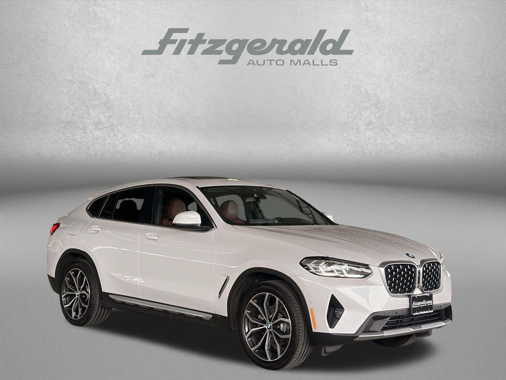 used 2023 BMW X4 car, priced at $35,294