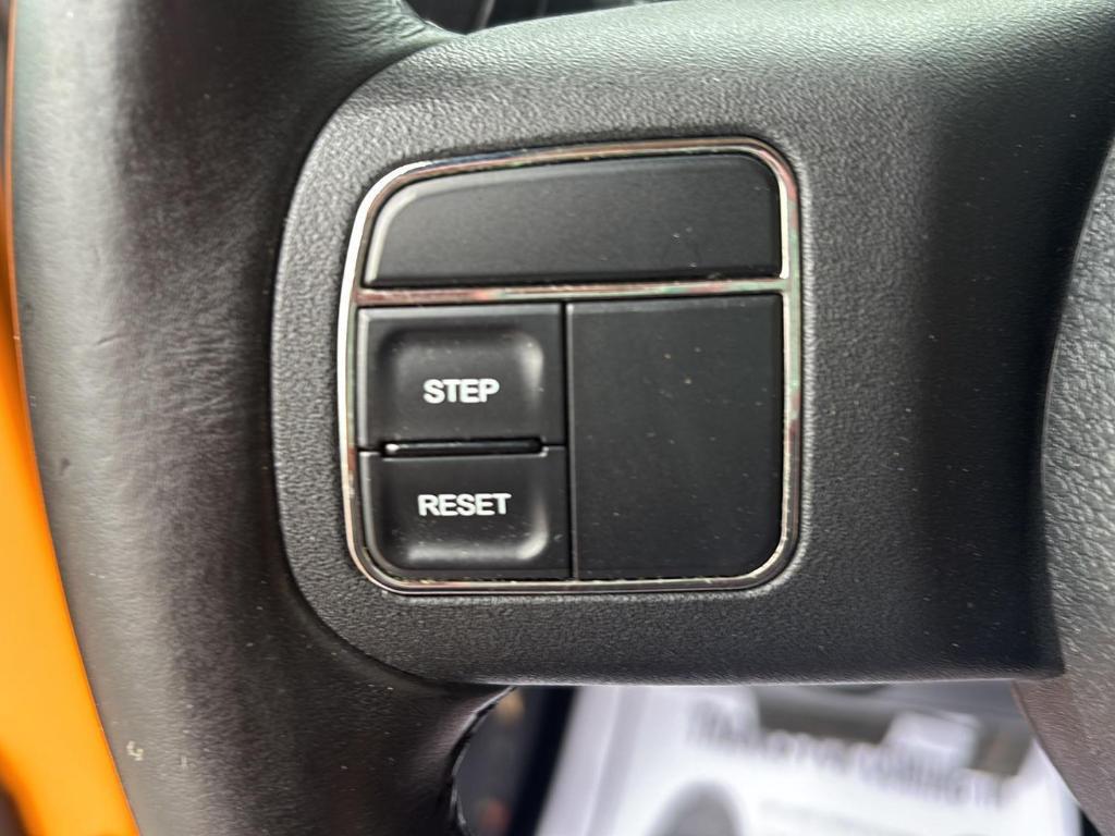 used 2012 Jeep Wrangler Unlimited car, priced at $16,990