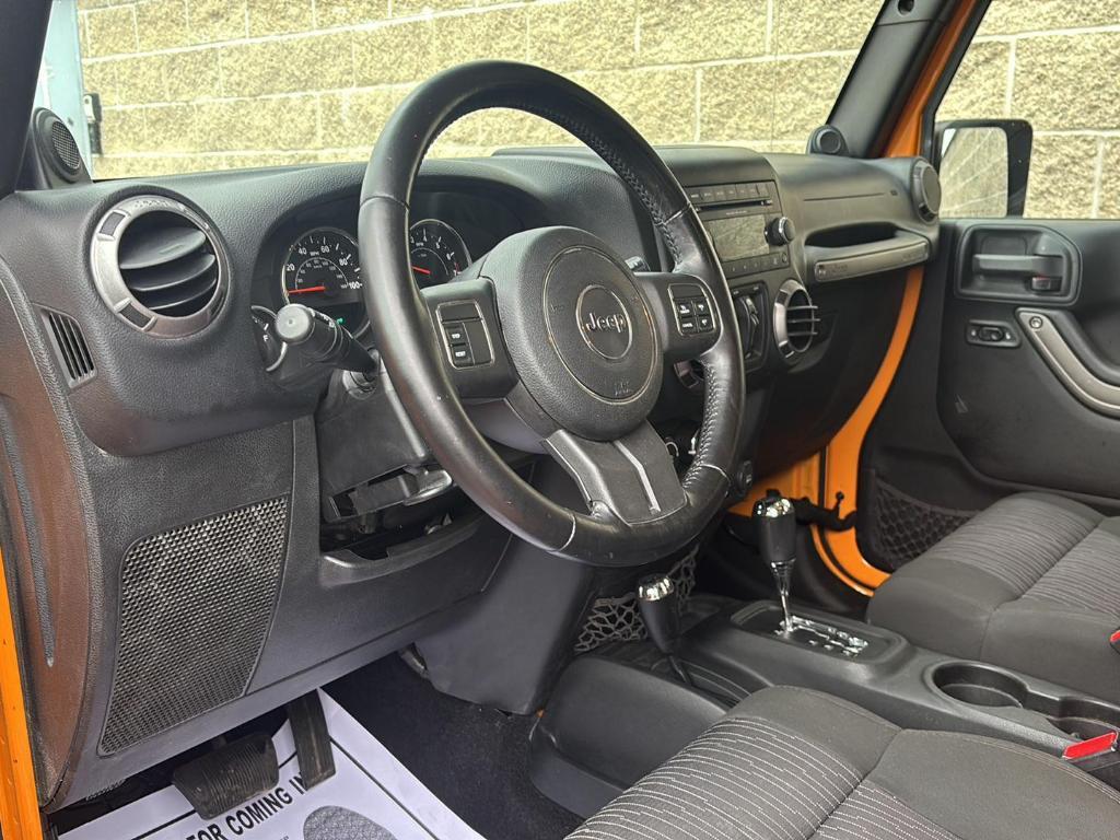 used 2012 Jeep Wrangler Unlimited car, priced at $16,990