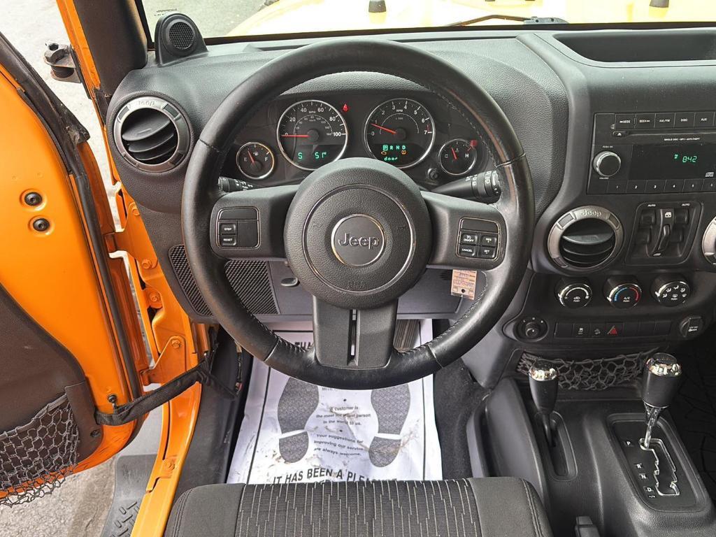 used 2012 Jeep Wrangler Unlimited car, priced at $16,990