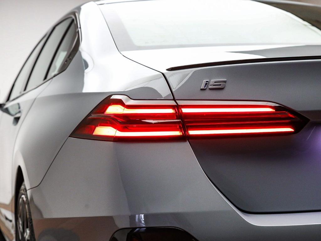 used 2025 BMW i5 car, priced at $55,591