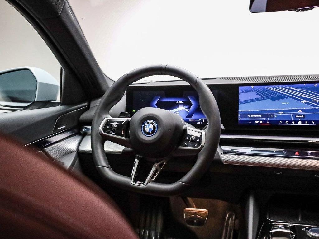 used 2025 BMW i5 car, priced at $55,591