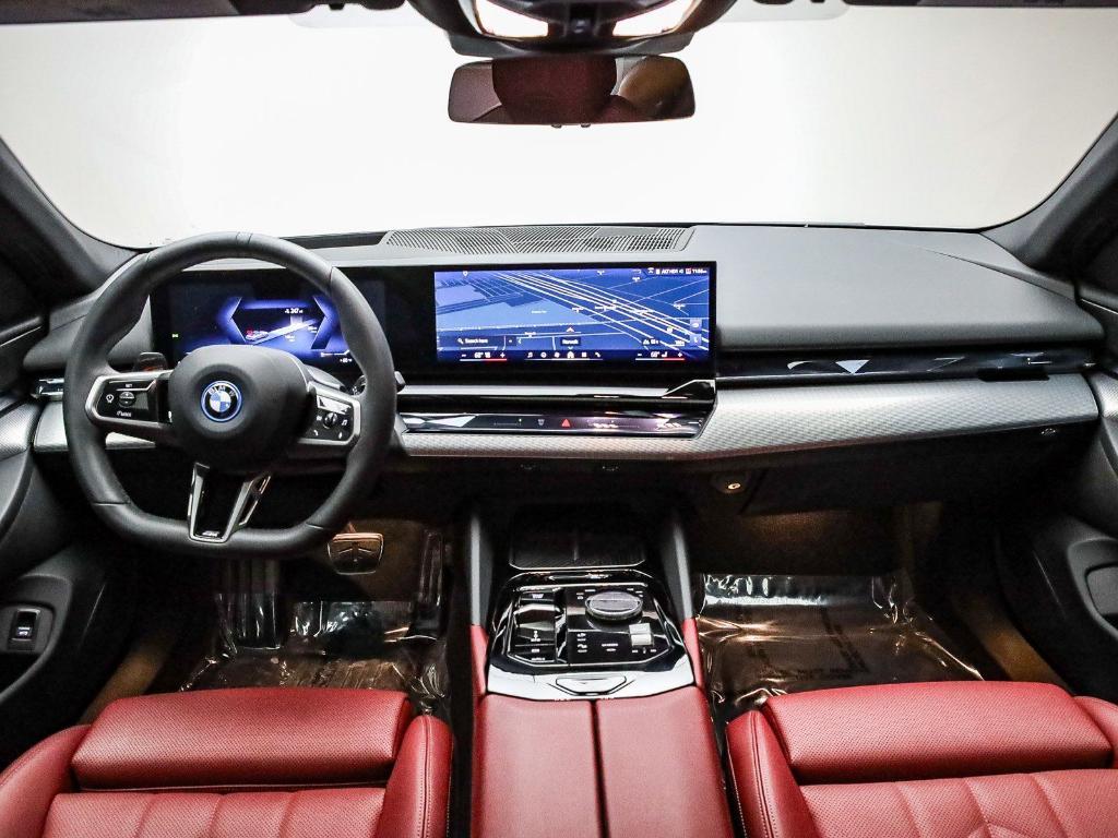 used 2025 BMW i5 car, priced at $55,591
