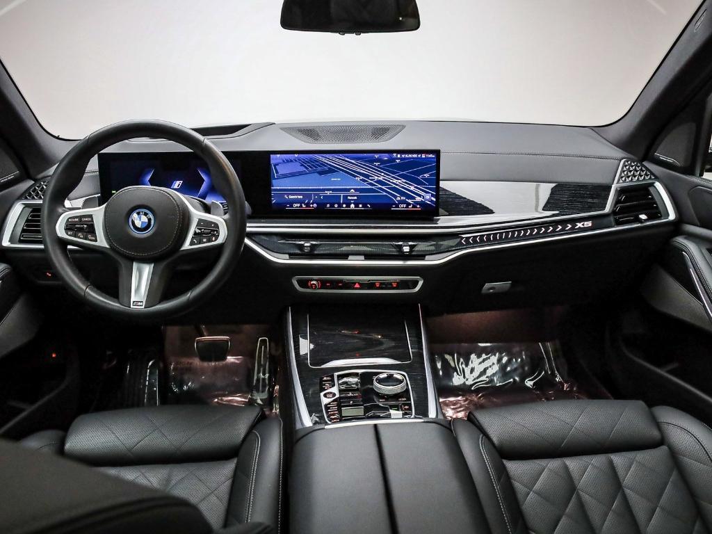 used 2025 BMW X5 PHEV car, priced at $68,491