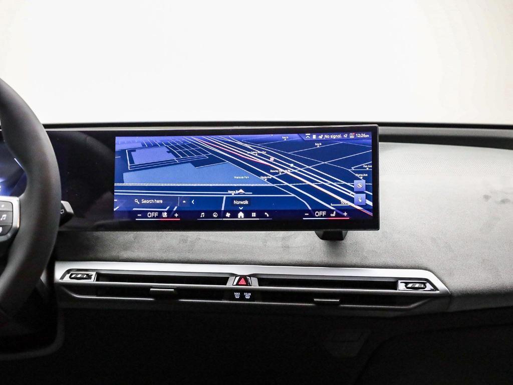 new 2026 BMW iX car, priced at $87,700