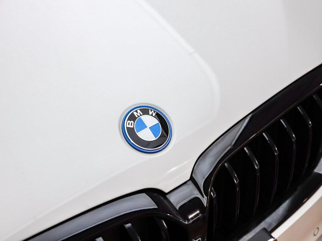 used 2023 BMW 530e car, priced at $33,593