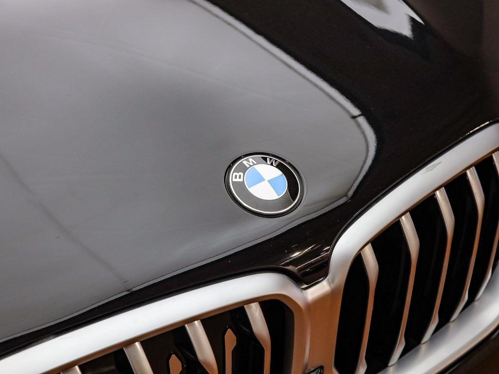 used 2023 BMW X6 car, priced at $57,491