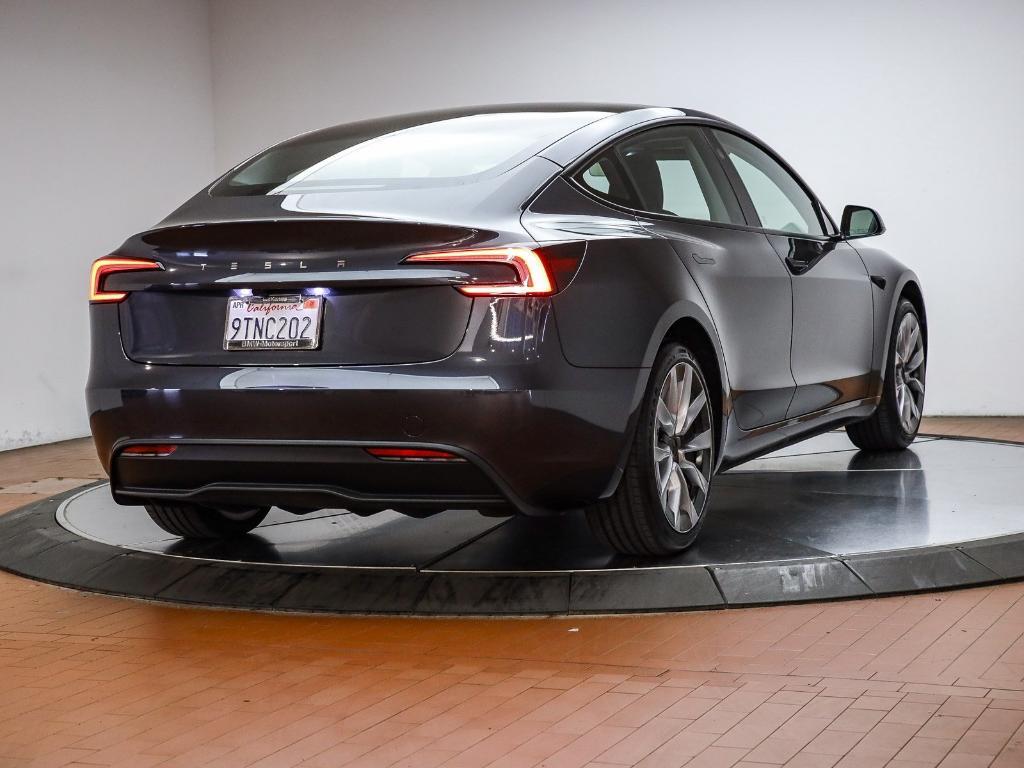 used 2025 Tesla Model 3 car, priced at $35,891