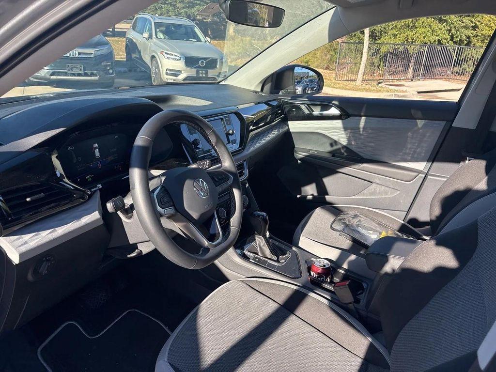 used 2023 Volkswagen Taos car, priced at $18,800