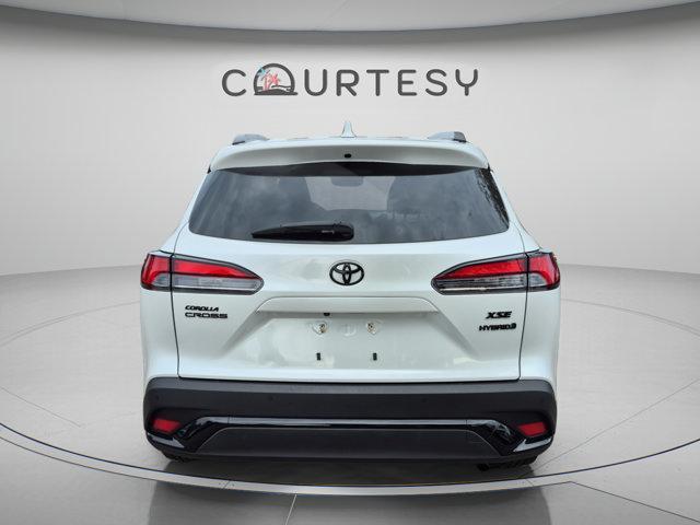 used 2024 Toyota Corolla Cross Hybrid car, priced at $29,939