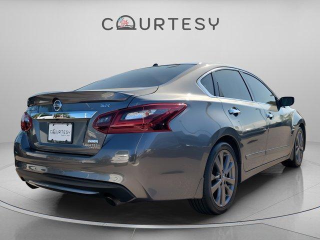 used 2018 Nissan Altima car, priced at $9,998