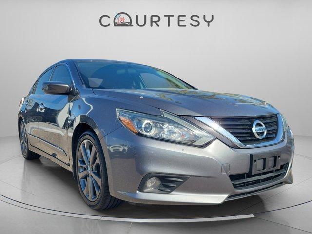 used 2018 Nissan Altima car, priced at $9,998
