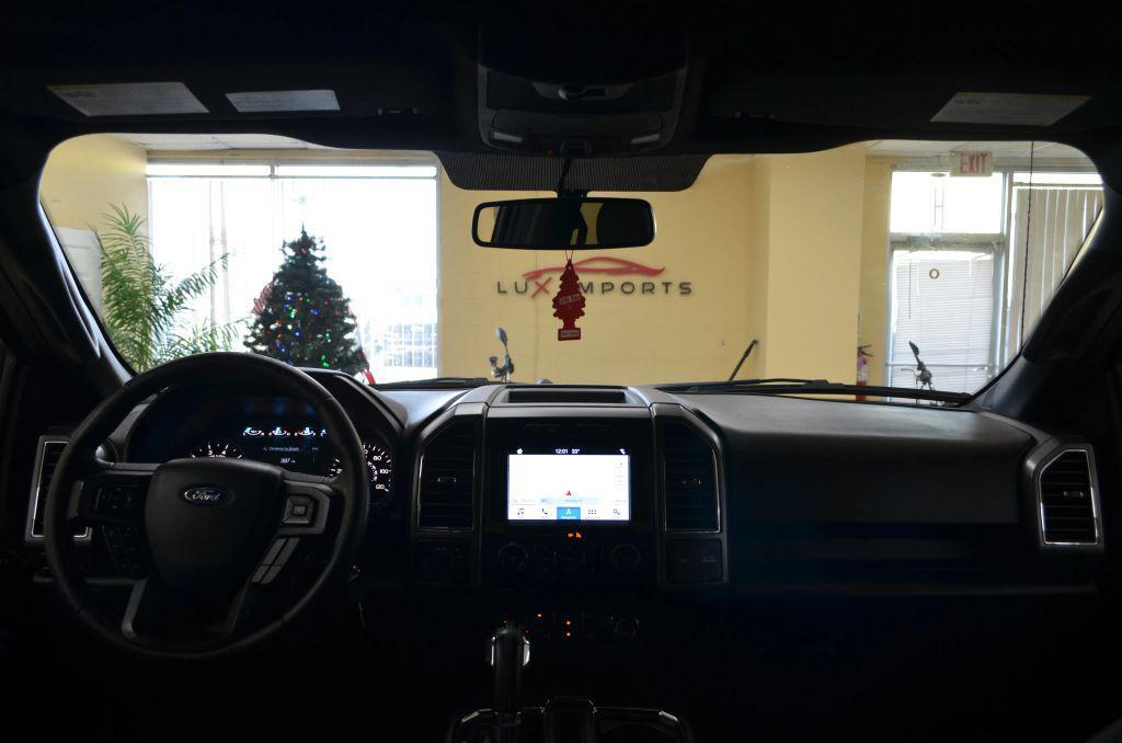 used 2018 Ford F-150 car, priced at $22,991