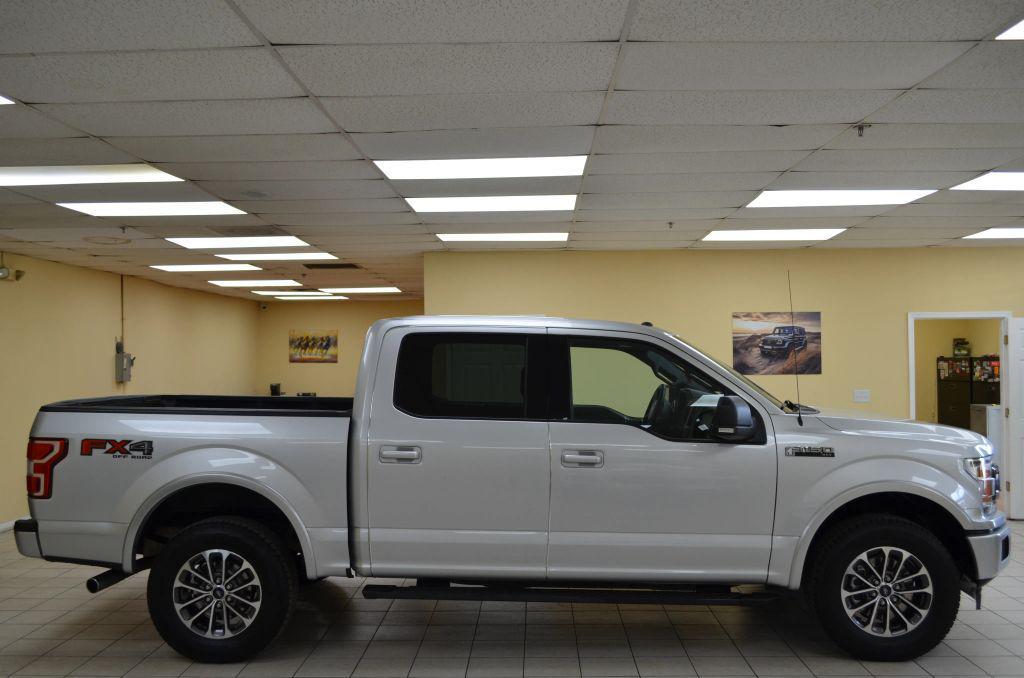 used 2018 Ford F-150 car, priced at $22,991