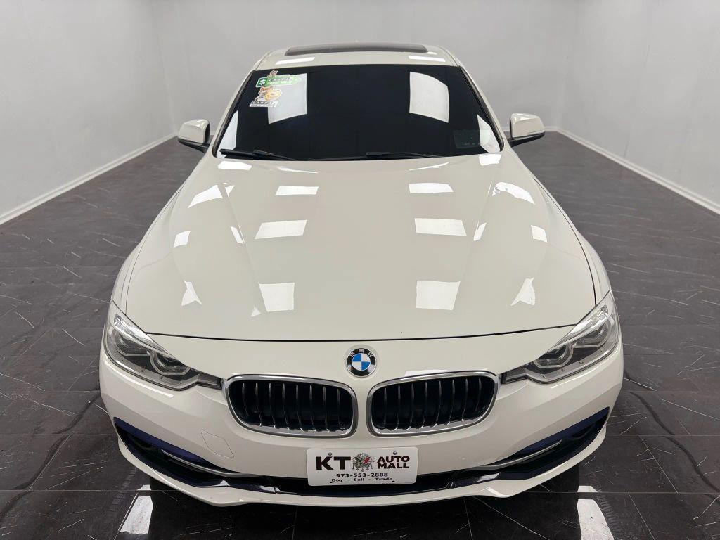 used 2018 BMW 330 car, priced at $11,995
