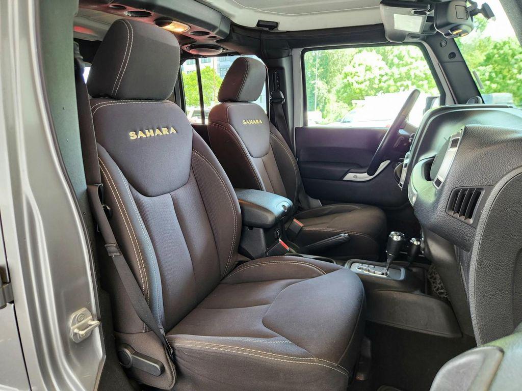 used 2013 Jeep Wrangler Unlimited car, priced at $16,969