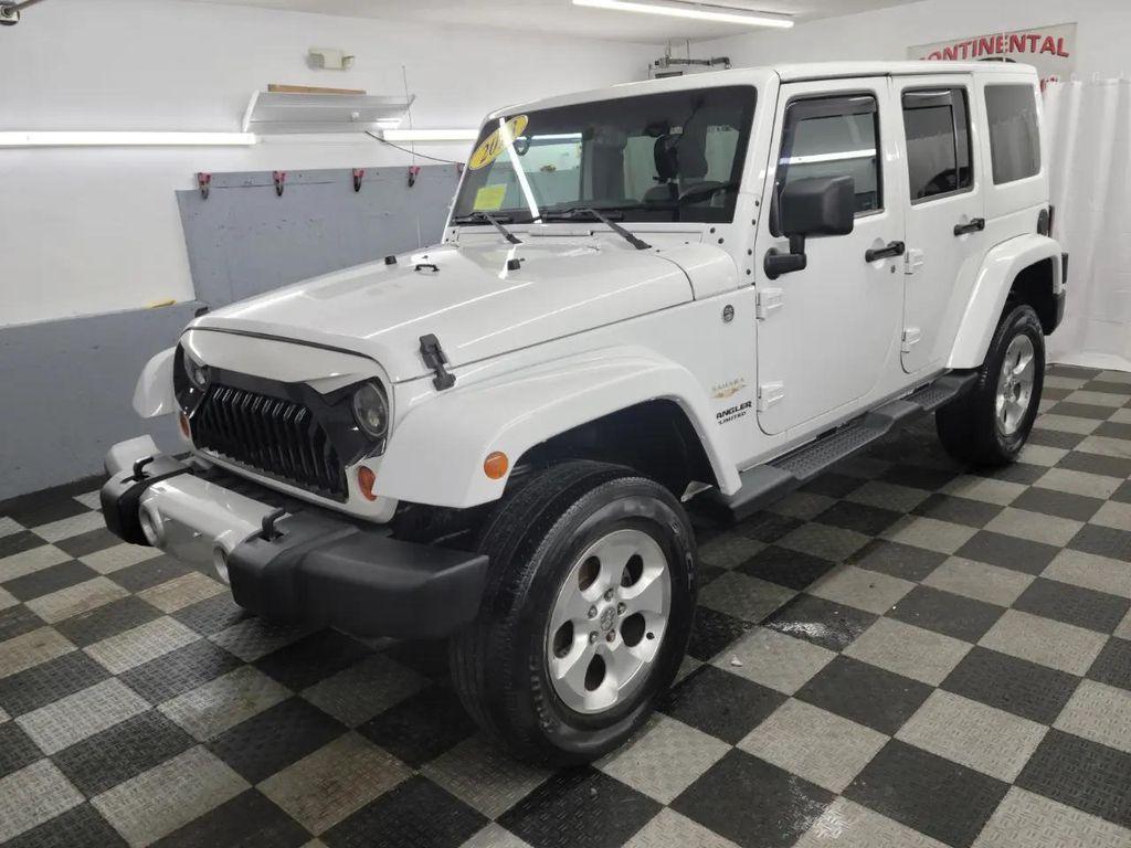 used 2013 Jeep Wrangler Unlimited car, priced at $13,995