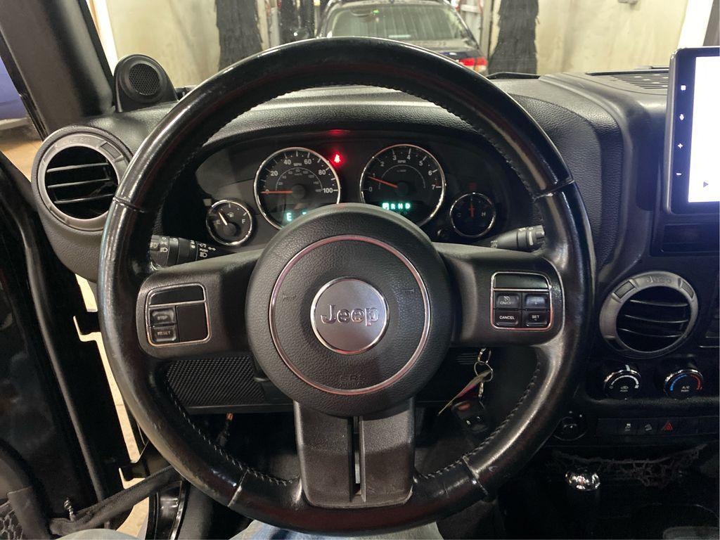 used 2012 Jeep Wrangler Unlimited car, priced at $12,999