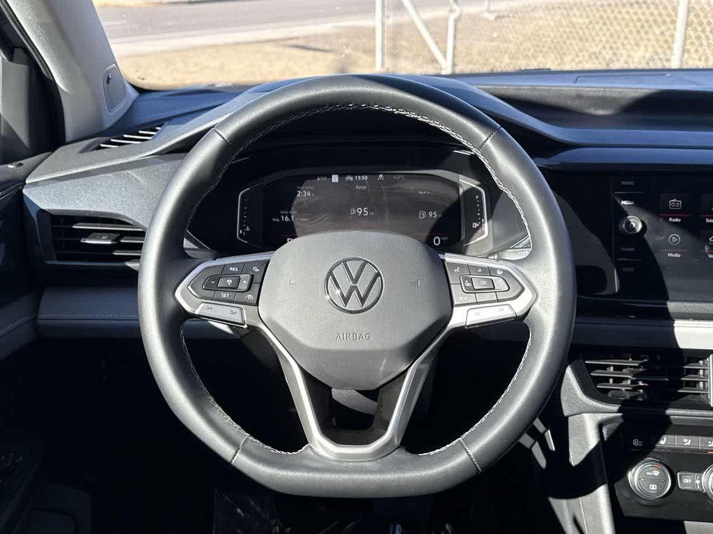 used 2022 Volkswagen Taos car, priced at $20,599