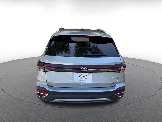 used 2025 Volkswagen Taos car, priced at $22,606