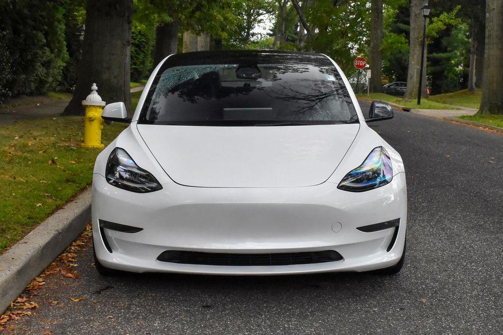 used 2023 Tesla Model 3 car, priced at $17,795