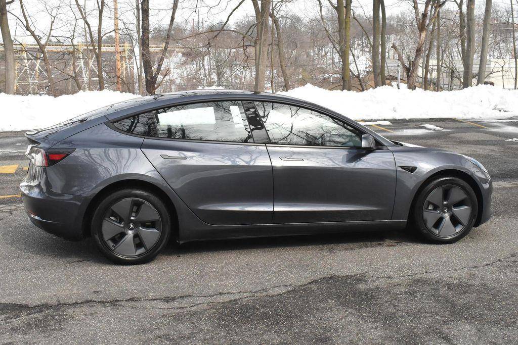 used 2023 Tesla Model 3 car, priced at $20,995
