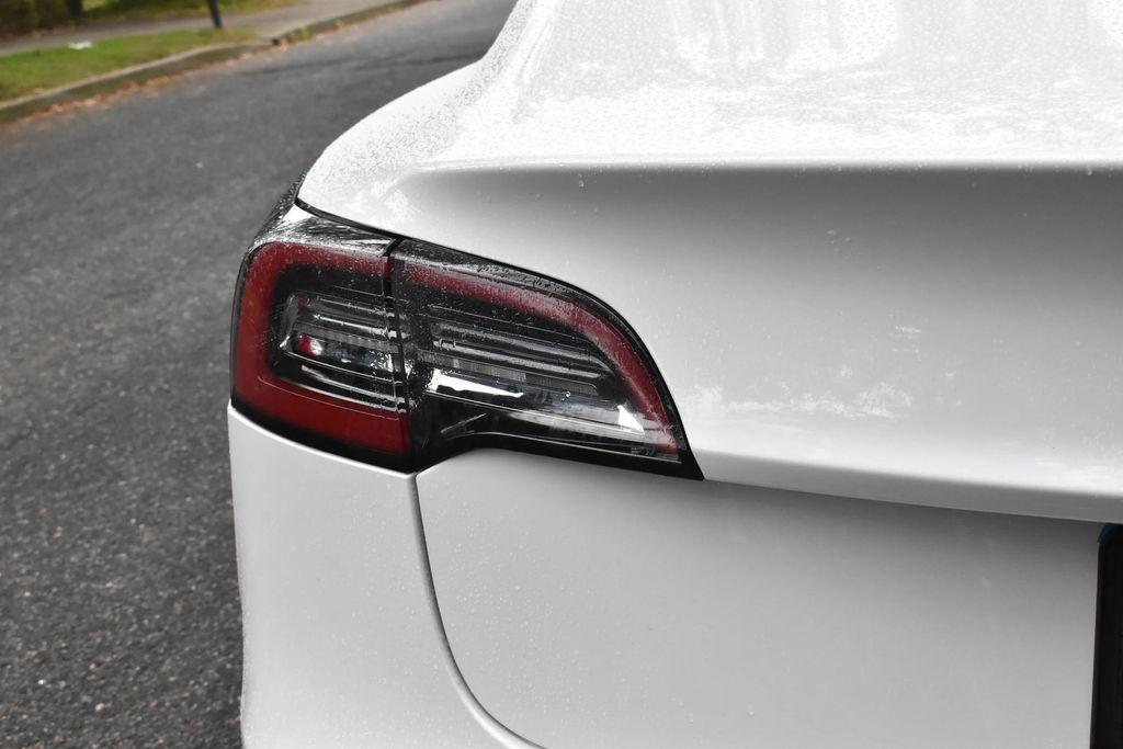 used 2023 Tesla Model 3 car, priced at $21,995